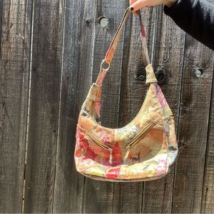 Flower shoulder bag colorful and tan with two exterior pockets